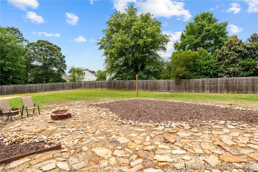 383 Yorkshire Drive Cameron, NC 28326 - Photo 41 of 49 a view of a backyard with swimming pool