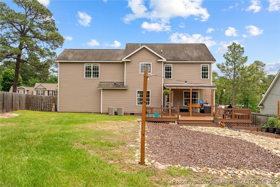 383 Yorkshire Drive Cameron, NC 28326 - Photo 45 of 49 a view of a house with backyard and a tree