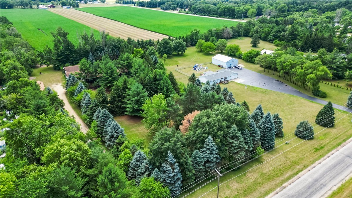 a view of a lake with a yard