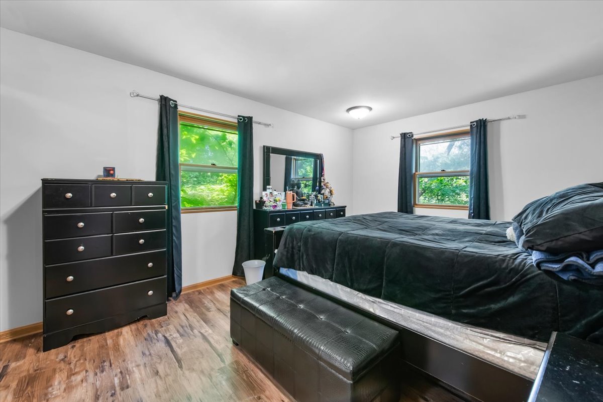 1834 Fischer Road South Beloit, IL 61080 - Photo 16 of 46 a bedroom with a bed and a window