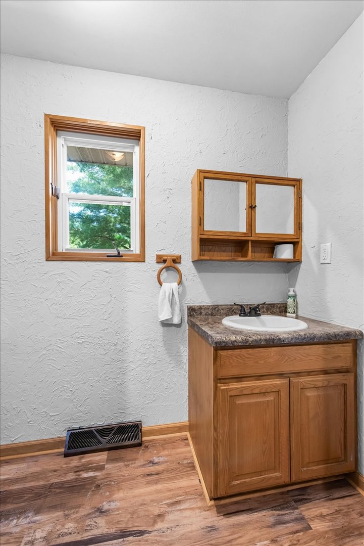 1834 Fischer Road South Beloit, IL 61080 - Photo 21 of 46 a kitchen with a stove and a window