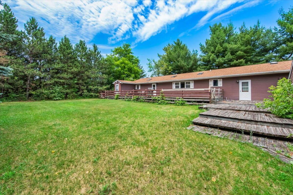 1834 Fischer Road South Beloit, IL 61080 - Photo 39 of 46 a view of a house with a backyard