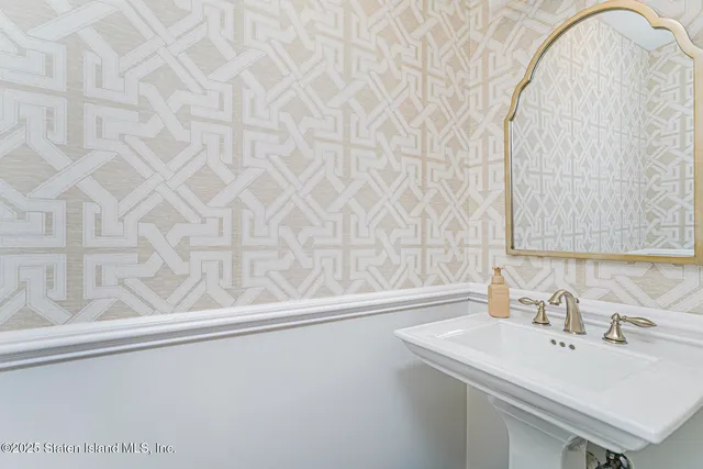 a bedroom with bed and window