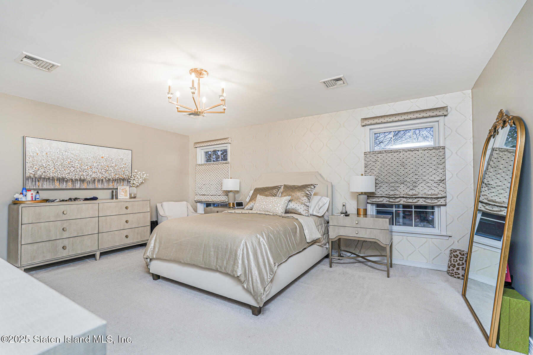 133 Goodwin Avenue Staten Island, NY 10314 - Photo 24 of 54 a spacious bedroom with a bed and a window