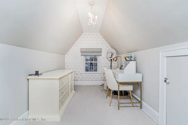a bathroom with a shower a toilet and sink