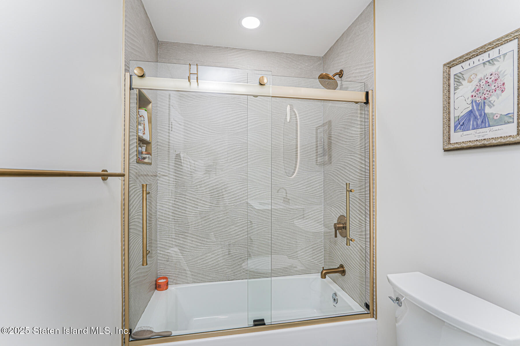 133 Goodwin Avenue Staten Island, NY 10314 - Photo 32 of 54 a bathroom with a shower a toilet and sink