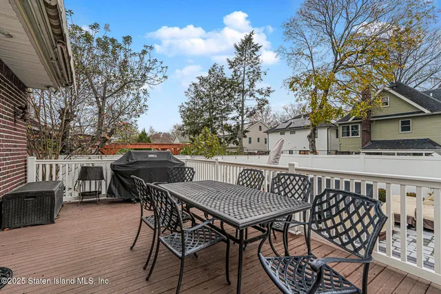 a car parked in front of a yard