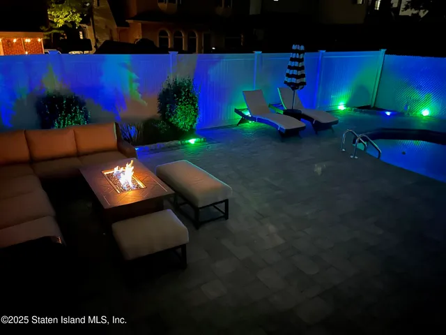 a view of a back yard of the house