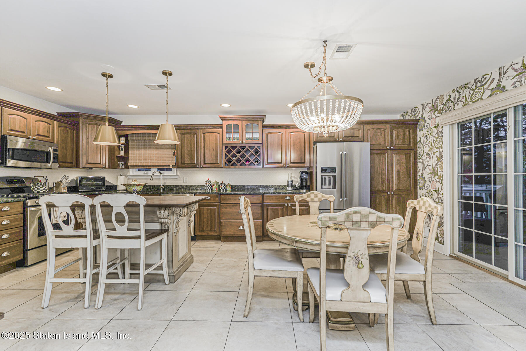 133 Goodwin Avenue Staten Island, NY 10314 - Photo 10 of 54 a view of a dining room with furniture window and wooden floor