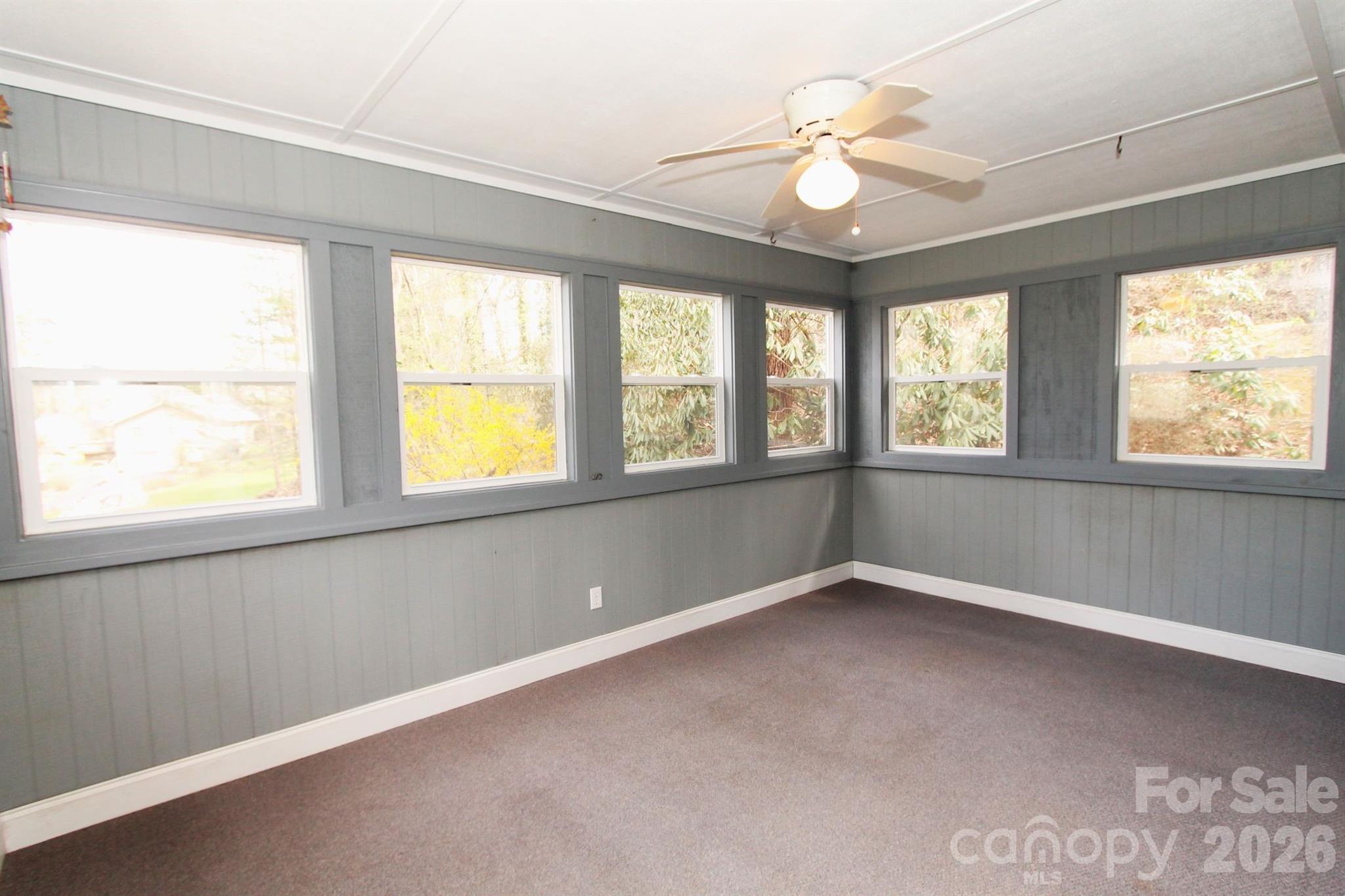 407 Turley Falls Road Hendersonville, NC 28739 - Photo 22 of 28 a view of an empty room with a window