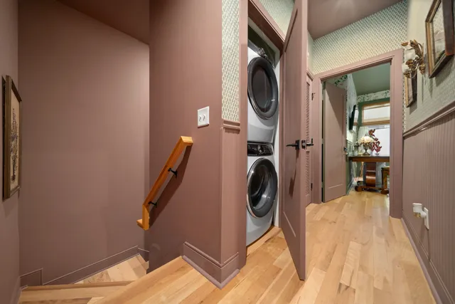 a bathroom with mirror and sink