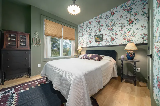 a view of a painting of a tree in a room