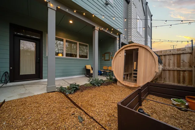 an aerial view of a house with a lake view