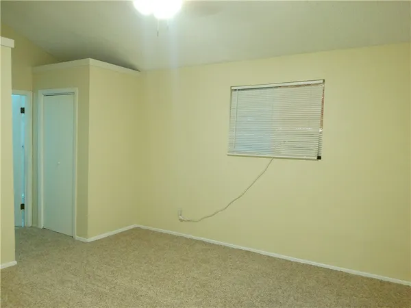 a view of small space with racks on the wall