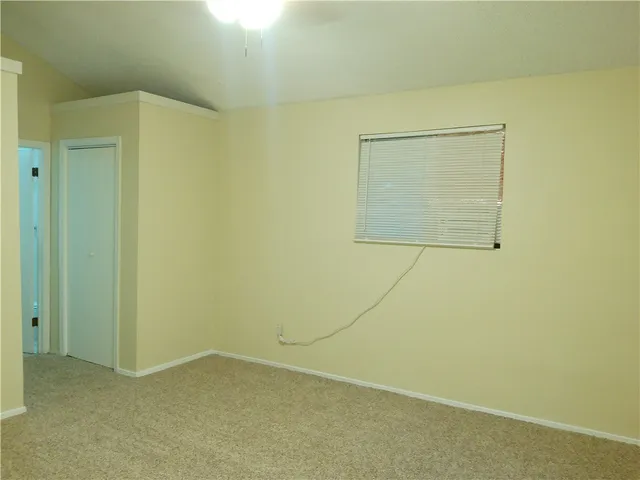 a view of small space with racks on the wall