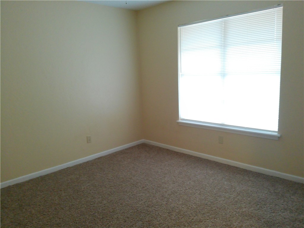 109 Sutherland Drive Portland, TX 78374 - Photo 6 of 17 an empty room with a window