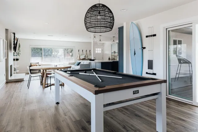 a kitchen with a counter space a sink appliances and a window