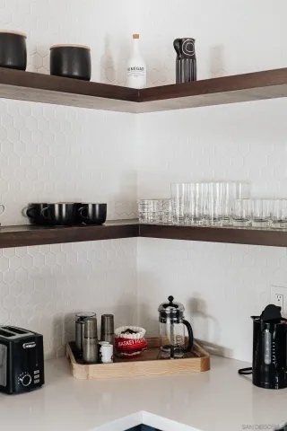 a view of a closet with clothes