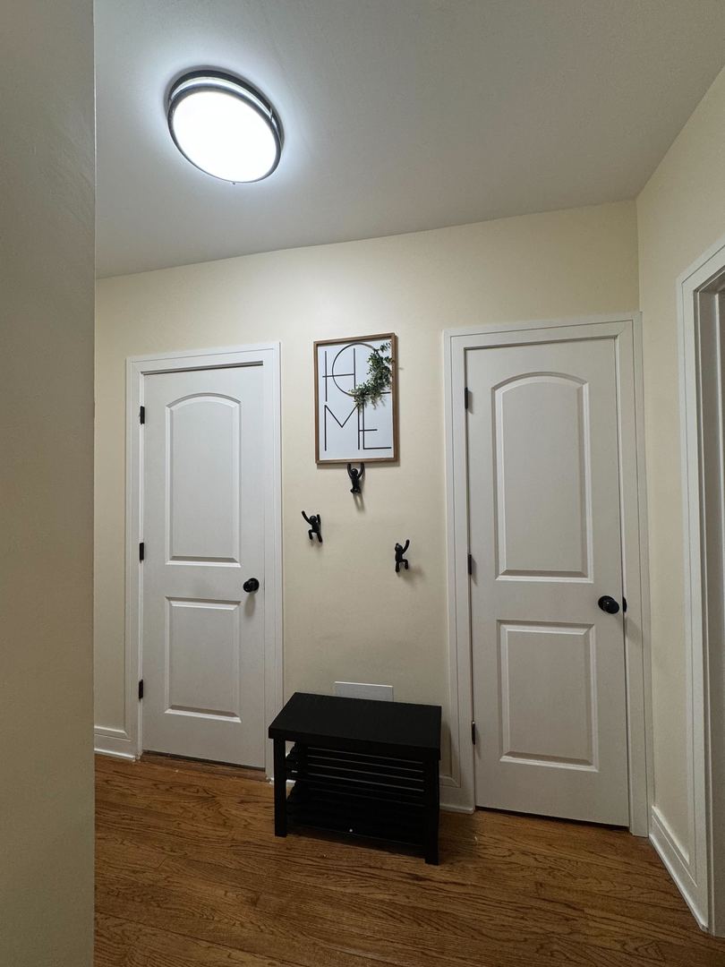 610 East 74th Street, Unit 1B Chicago, IL 60619 - Photo 3 of 15 a view of a livingroom with wooden floor