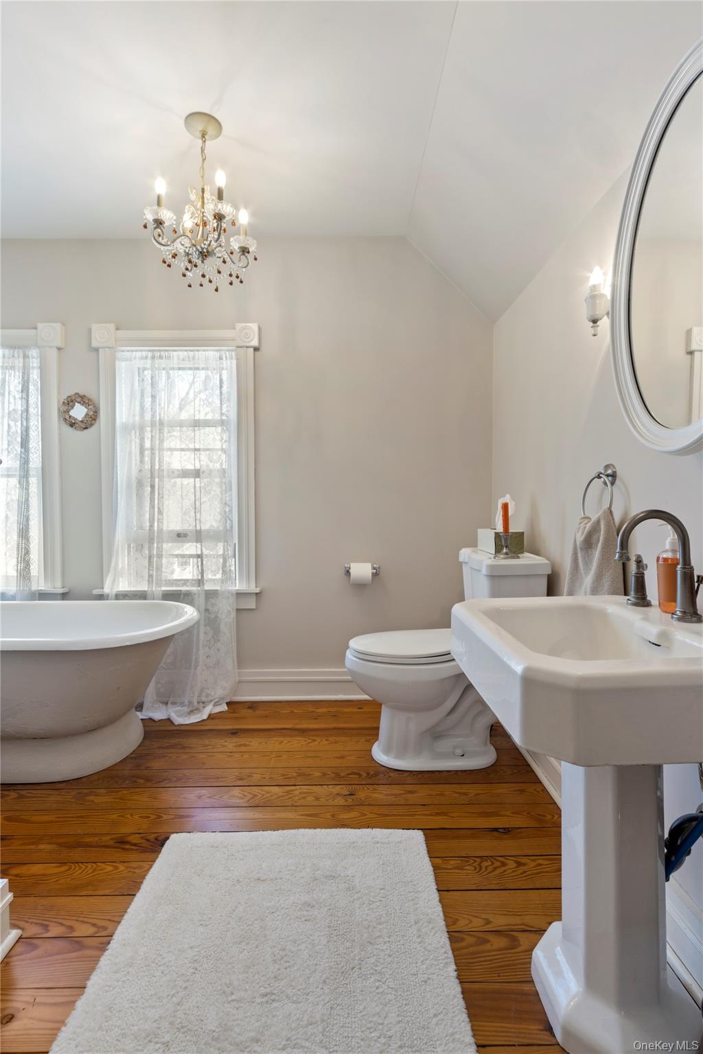 26 Chatham Street Kinderhook, NY 12106 - Photo 11 of 18 a bathroom with a sink and a mirror