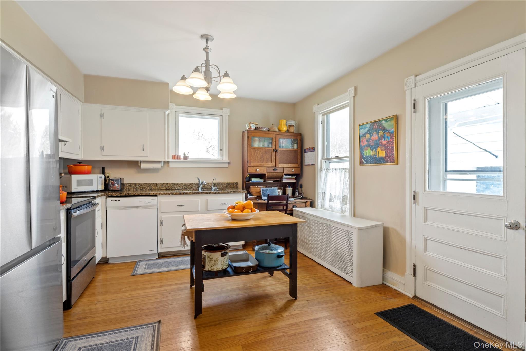 26 Chatham Street Kinderhook, NY 12106 - Photo 4 of 18 a view of a kitchen and dining room