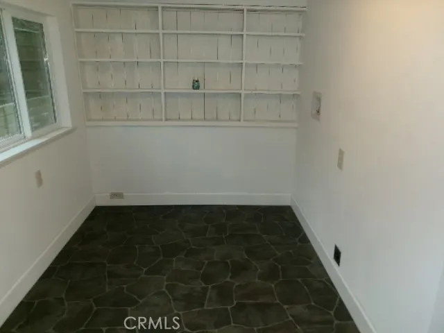 a view of a bathroom from a hallway