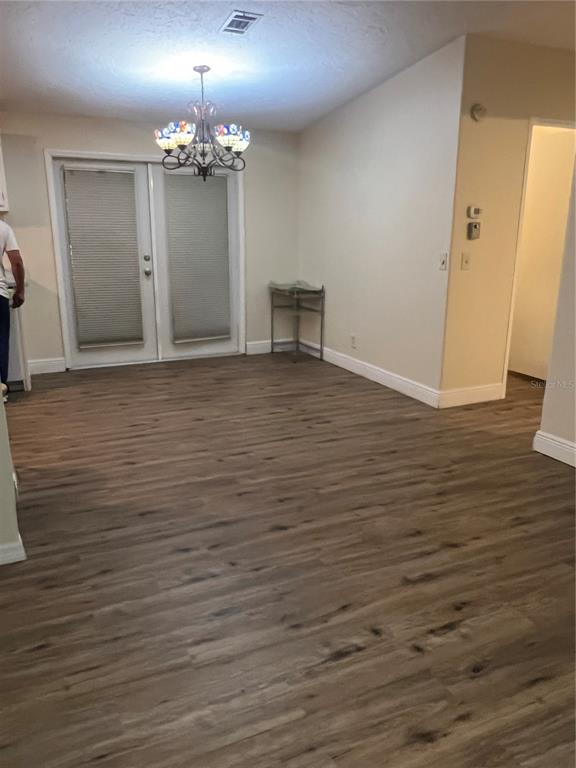 2833 Southeast 18th Terrace Okeechobee, FL 34974 - Photo 11 of 34 a view of a livingroom with wooden floor