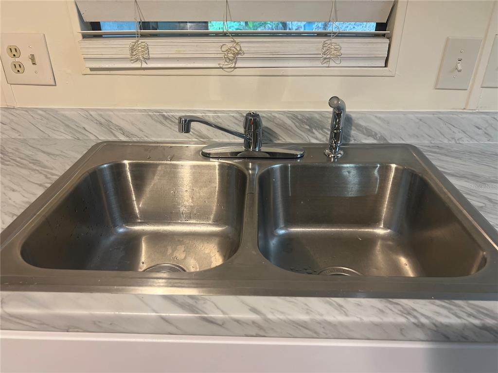 2833 Southeast 18th Terrace Okeechobee, FL 34974 - Photo 16 of 34 a close view of sink