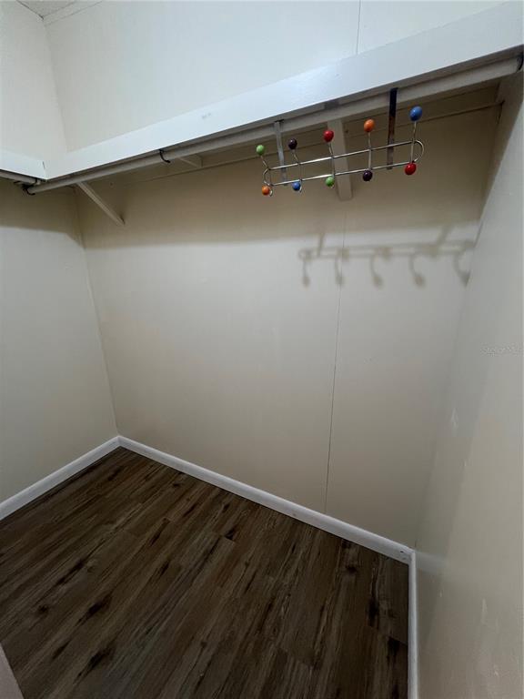 2833 Southeast 18th Terrace Okeechobee, FL 34974 - Photo 28 of 34 a view of a room with racks on the wall