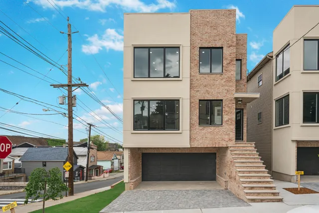 a front view of a house with a balcony