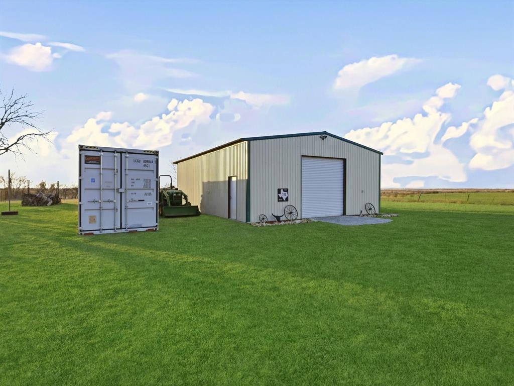 783 Christy Kay Lane Rhome, TX 76078 - Photo 24 of 31 30x40 workshop with electricity, RV hook ups, Extra storage available in the Sea Crate.