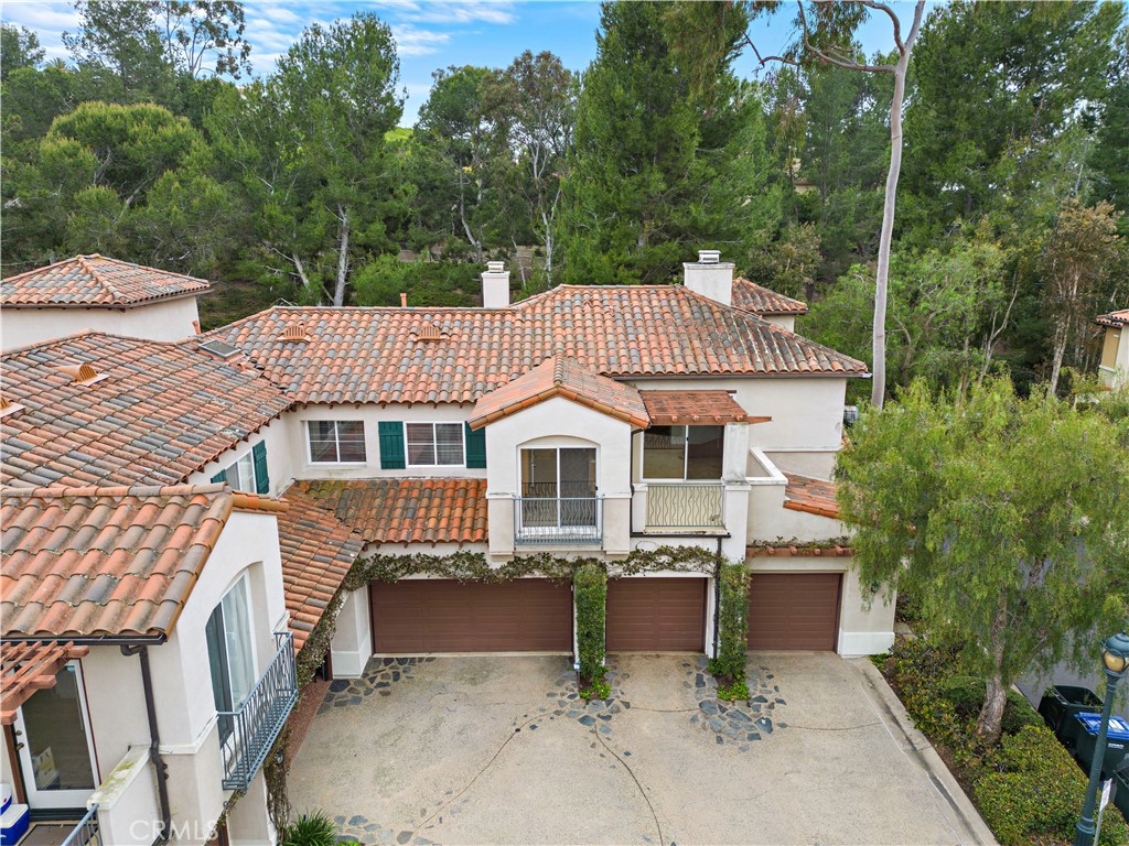 Undisclosed Address Newport Coast, CA 92657 - Photo 21 of 26 front view of a house with a yard