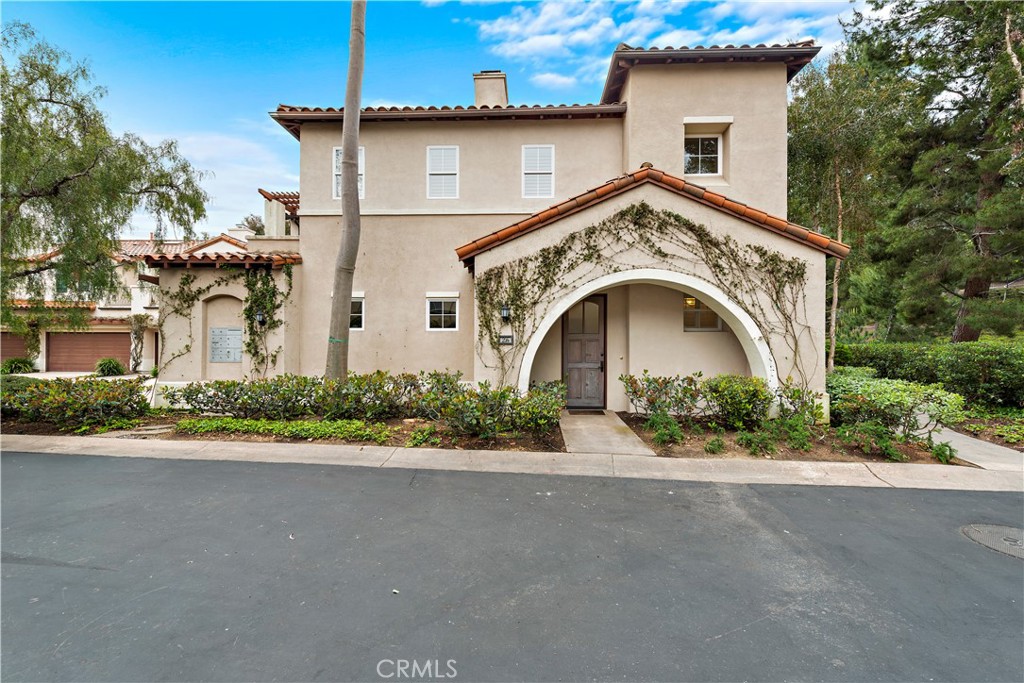 Undisclosed Address Newport Coast, CA 92657 - Photo 22 of 26 a view of a house with a yard and potted plants