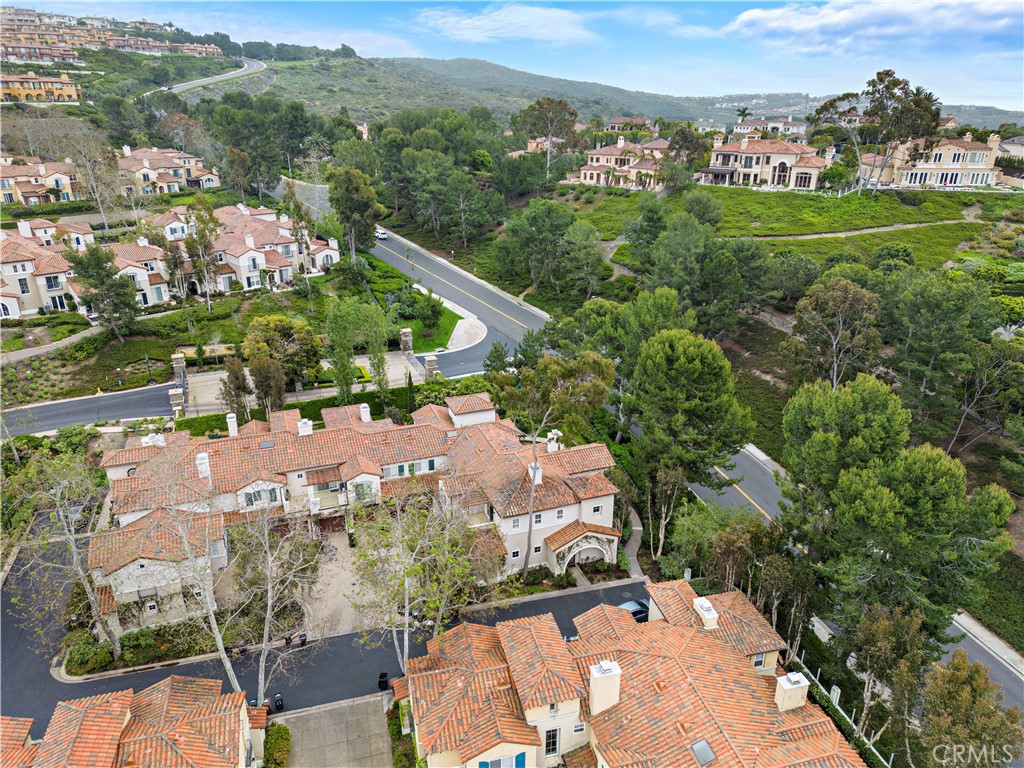 Undisclosed Address Newport Coast, CA 92657 - Photo 25 of 26 an aerial view of a house with a yard