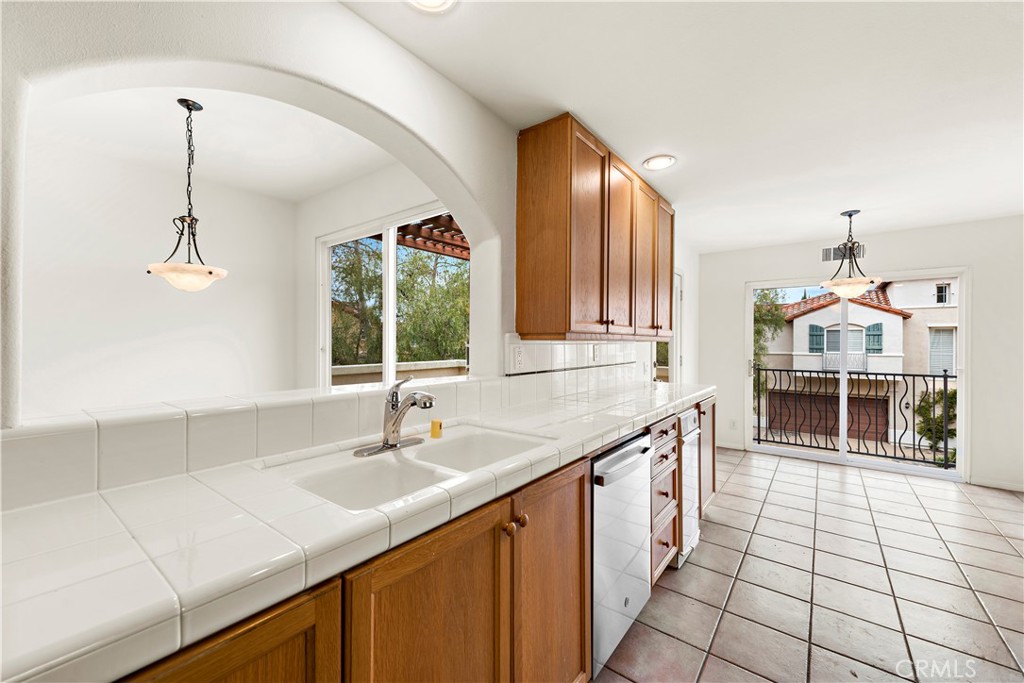 Undisclosed Address Newport Coast, CA 92657 - Photo 8 of 26 a kitchen with a sink and a window