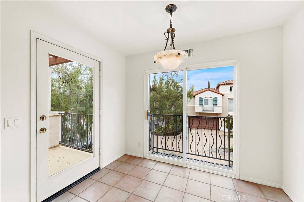 Undisclosed Address Newport Coast, CA 92657 - Photo 10 of 26 a view of a hallway with wooden floor and windows