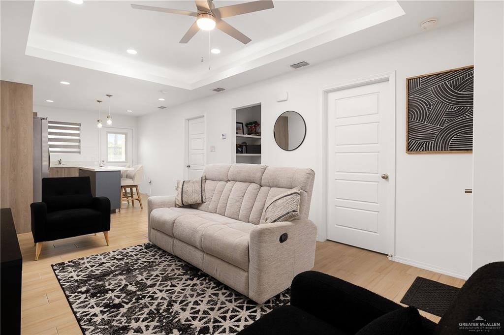 1527 West B Street Mission, TX 78572 - Photo 4 of 17 a living room with furniture and a rug