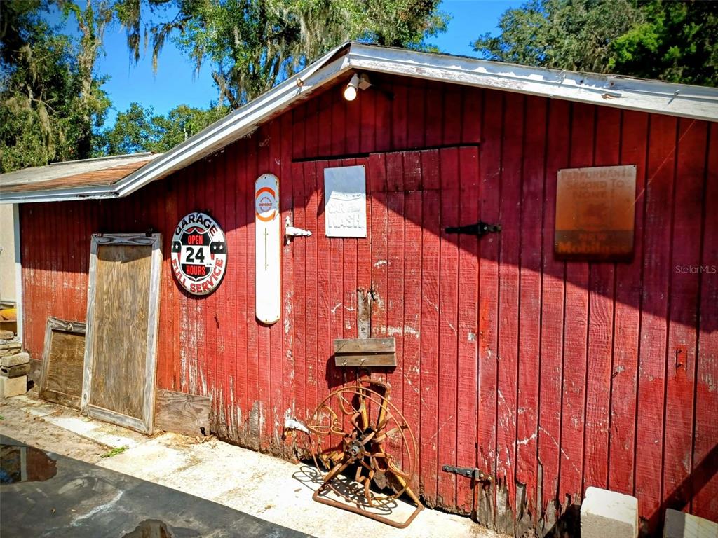 11 Sycamore Street Flagler Beach, FL 32136 - Photo 17 of 21 a front view of a house with garden