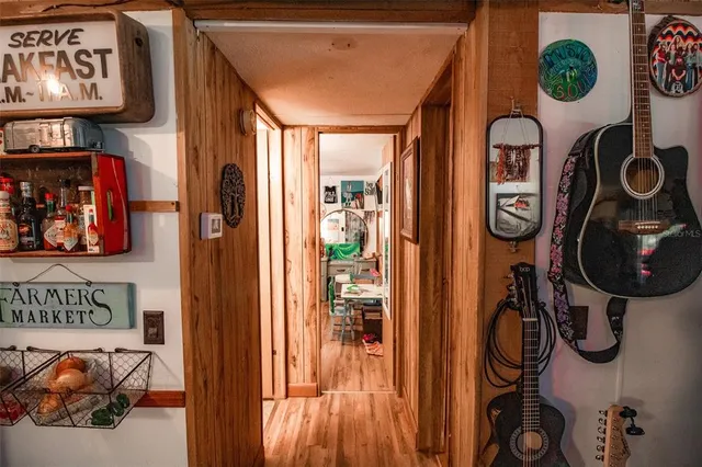 a bed room with a bed and a ceiling fan