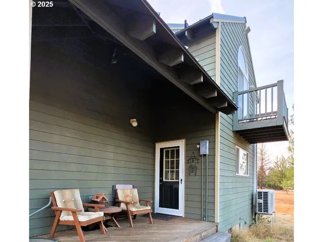 a house view with a backyard space