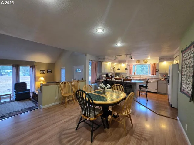 a view of a dining room with furniture