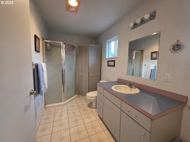 a room with a sink and a mirror