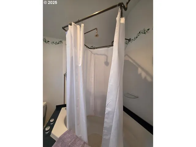 a swimming pool with trees in the background