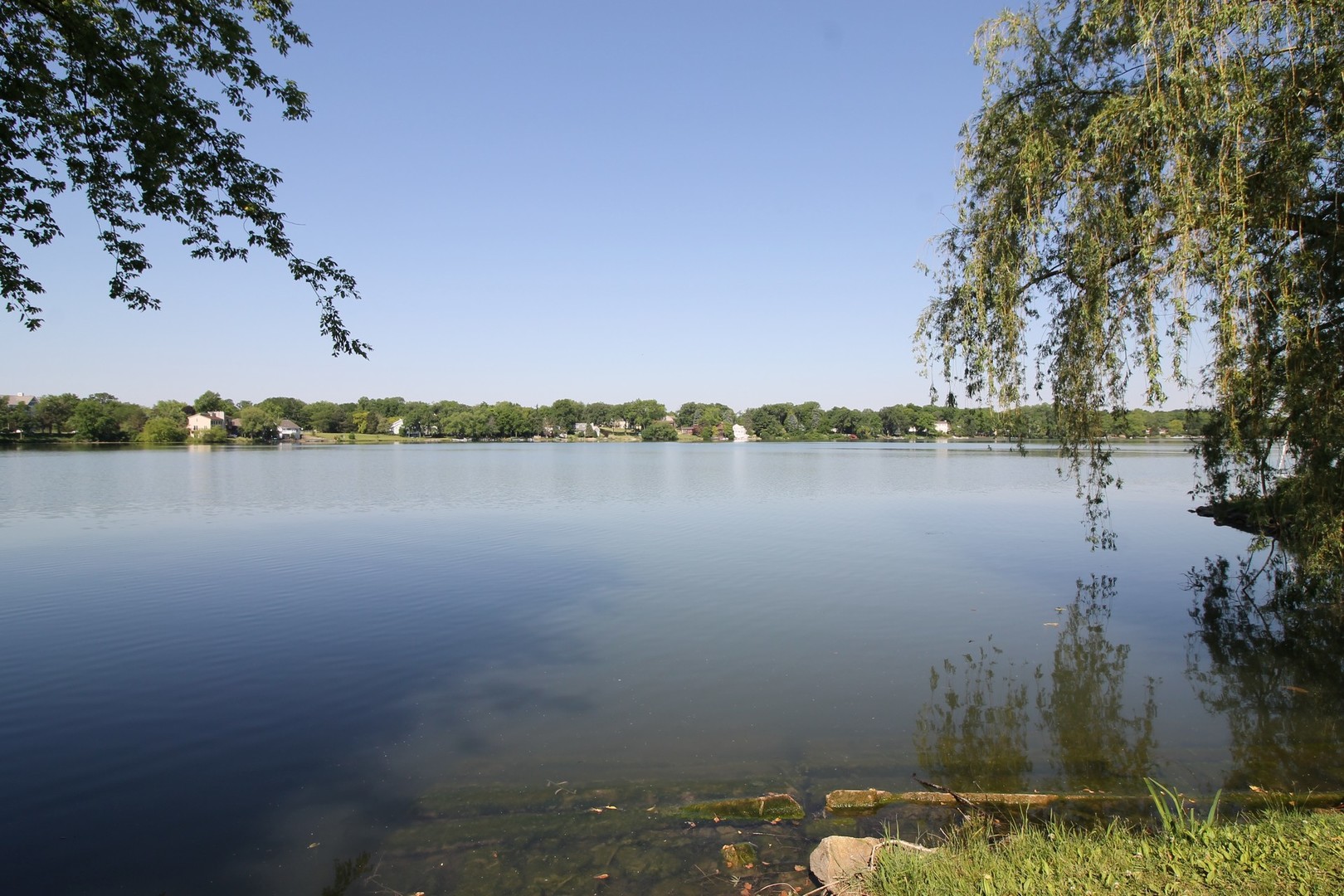 275 Harding Street Grayslake, IL 60030 - Photo 22 of 27 a view of lake with houses in background