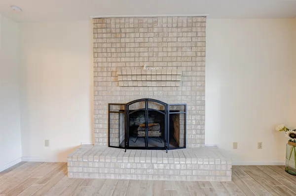 a white building with a fireplace