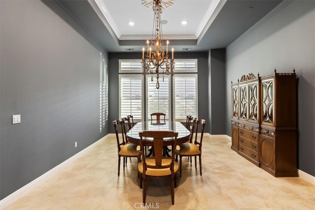 81094 Monarchos Circle La Quinta, CA 92253 - Photo 25 of 75 a view of a dining room with furniture window and outside view