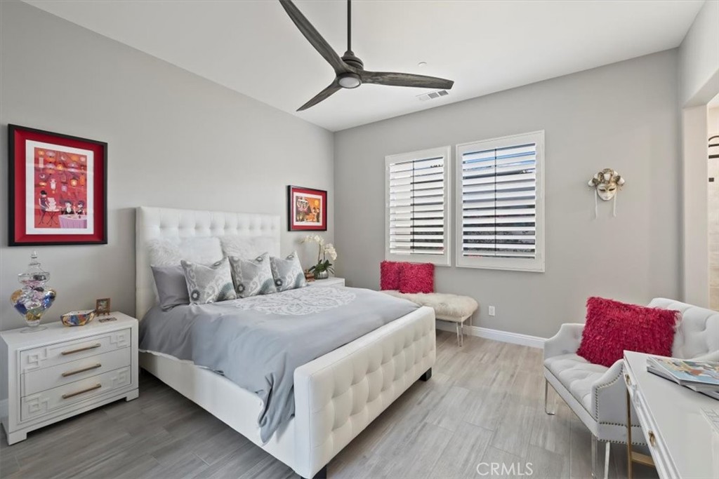 81094 Monarchos Circle La Quinta, CA 92253 - Photo 32 of 75 a bedroom with a bed and a window