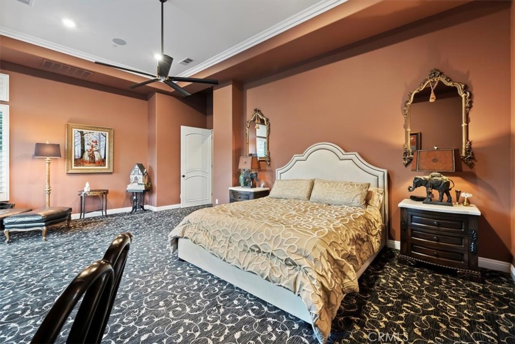 81094 Monarchos Circle La Quinta, CA 92253 - Photo 45 of 75 a bedroom with bed and wooden floor