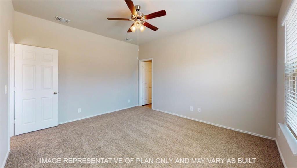 10312 Neptune Court Waco, TX 76708 - Photo 5 of 9 a view of a big room with carpet