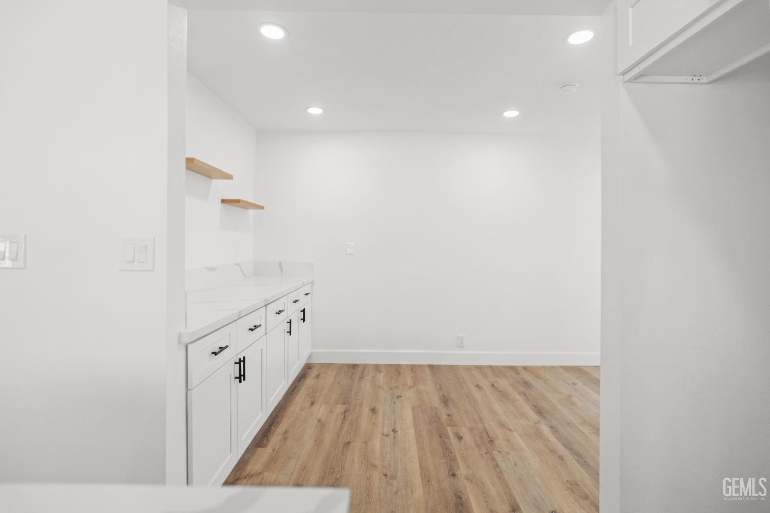 Undisclosed Address Tehachapi, CA 93561 - Photo 21 of 49 a view of hallway with wooden floor